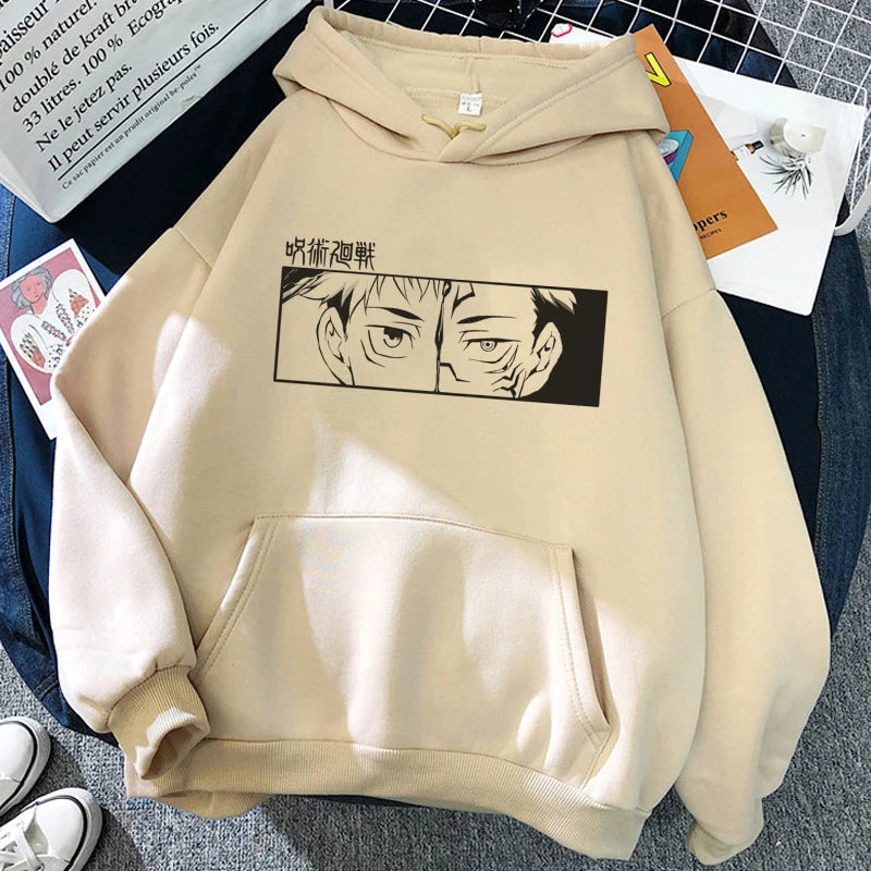 Sweat à capuche beige, imprimé noir deux visages dans un rectangle.