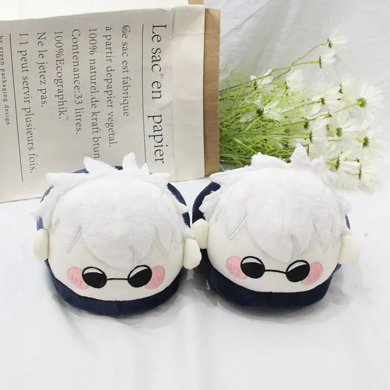 Chaussons en peluche bleu marine, deux têtes blanches avec lunettes rondes