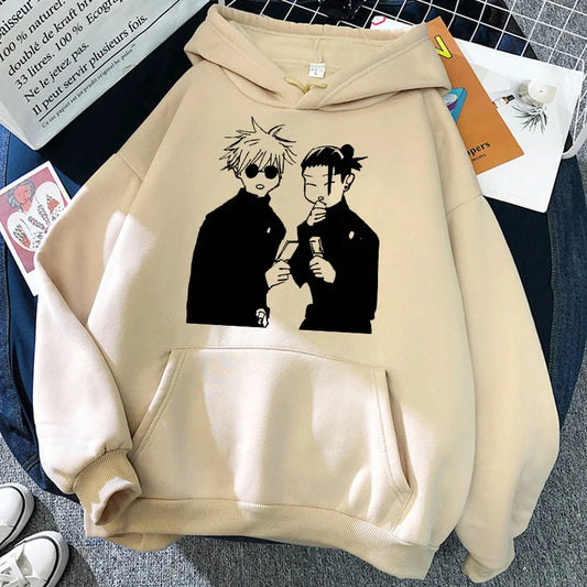 Sweat à capuche beige avec poche kangourou et imprimé de personnages sur le devant