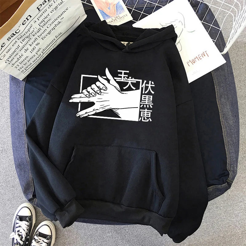 Pull à capuche noir avec grand motif blanc devant et poche kangourou