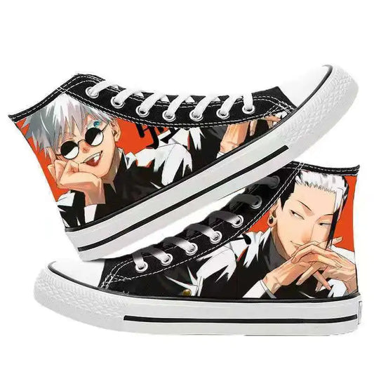 Chaussures montantes noires à lacets, imprimé personnages orange et semelle blanche