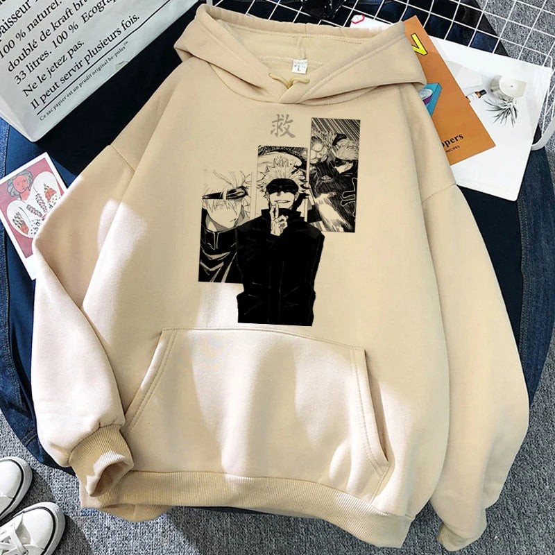 Sweat à capuche beige, grande poche kangourou et visuel noir avec personnage sur le devant