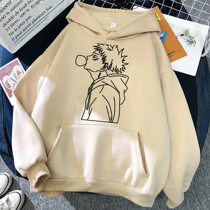 Sweat à capuche beige avec dessin noir de personnage sur la poitrine